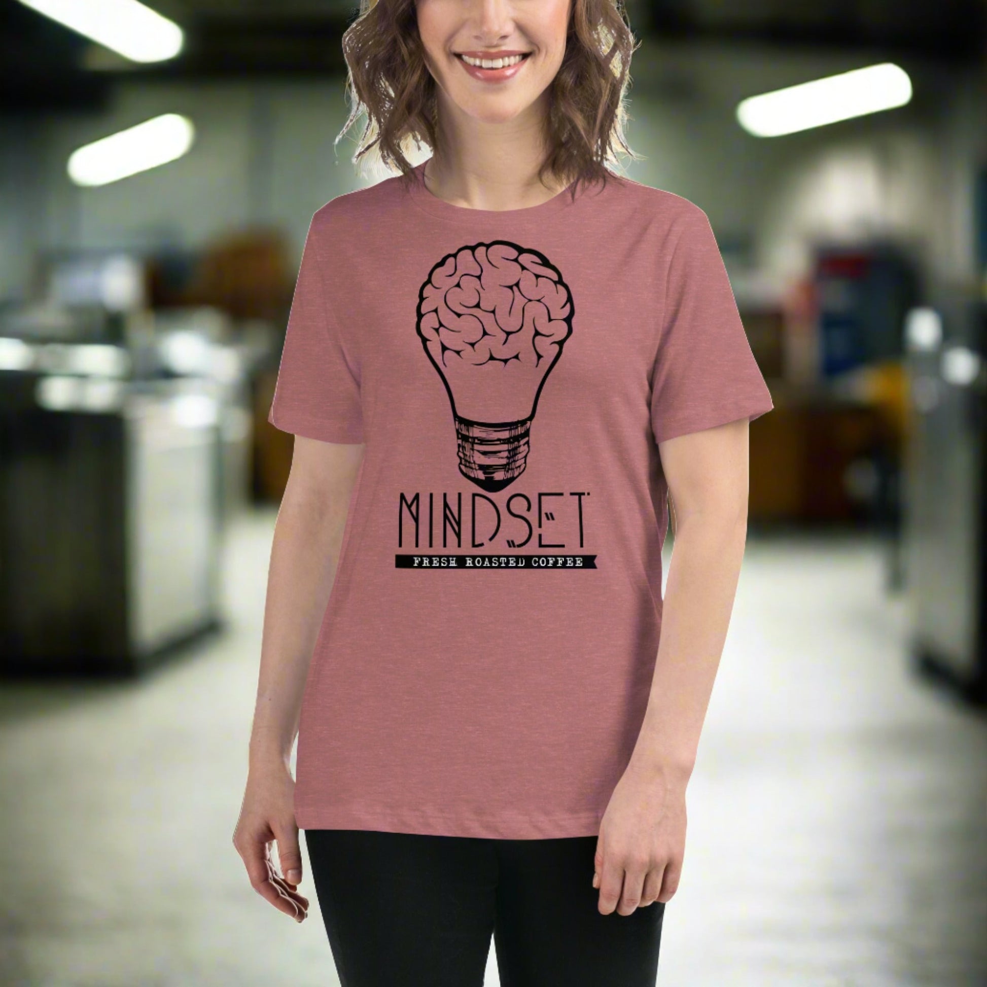 woman wearing mindset coffee shirt